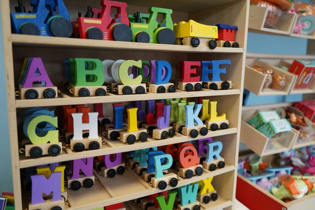Colourful alphabet toys on a shelf